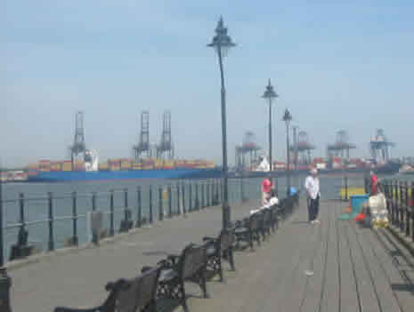 Harwich Pier With Felixstowe Container Port Across River