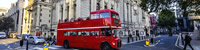Open top vintage London red bus tour