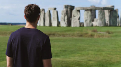 stonehenge and visitor