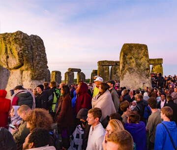 People at sunris at Stonehenge