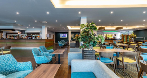 Hotel hall with tables and chairs