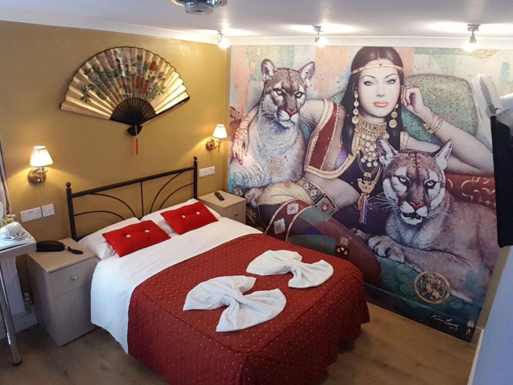 View of bedroom with wall feature at the Central hotel Camden