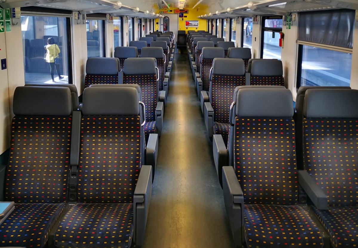 View looking down empty train carriage