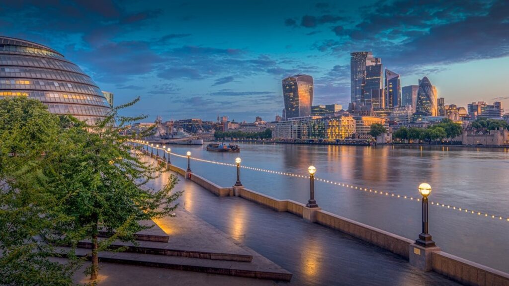 View of London city across the Thames at dusk
