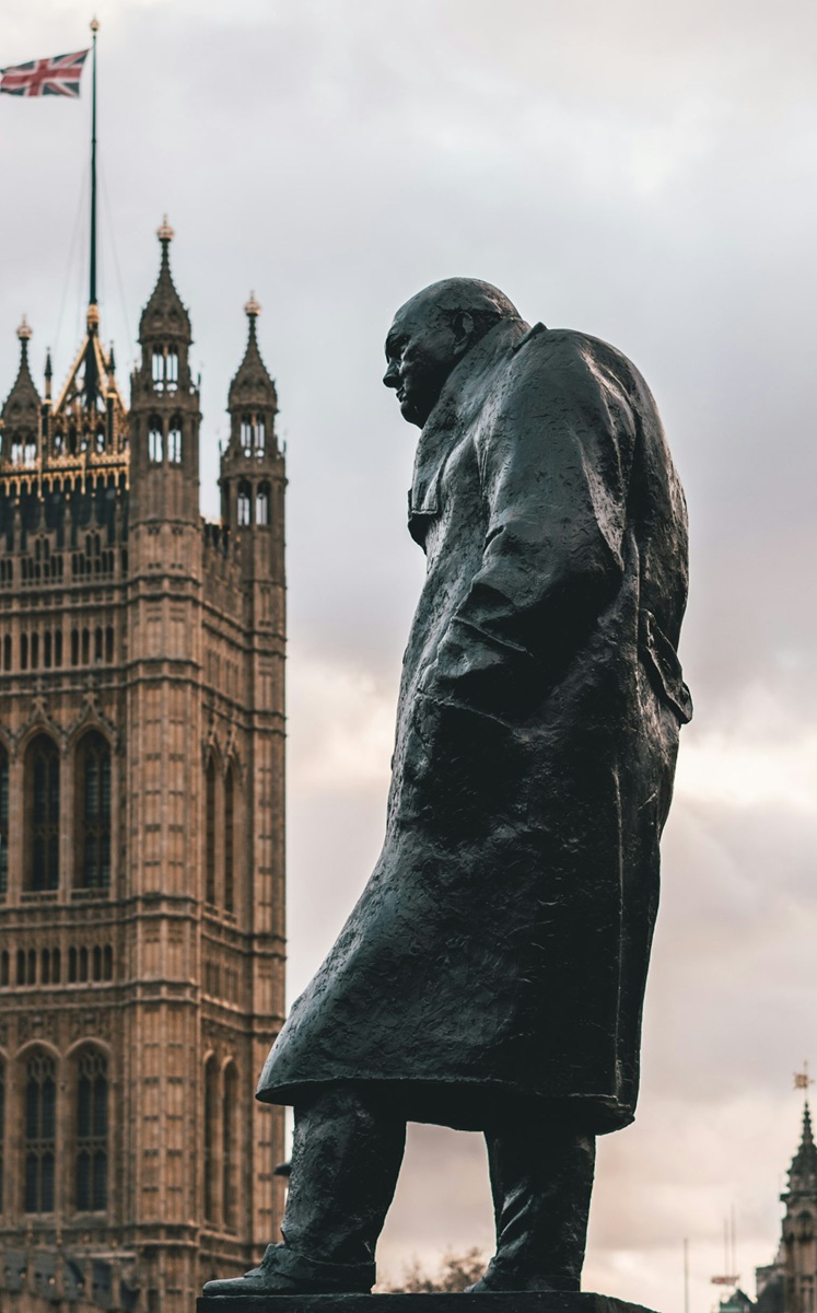 Winston Churchill Statue with the Palace of Westminster in the background