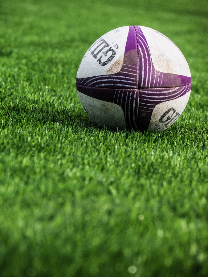 Gilbert rugby ball on grass